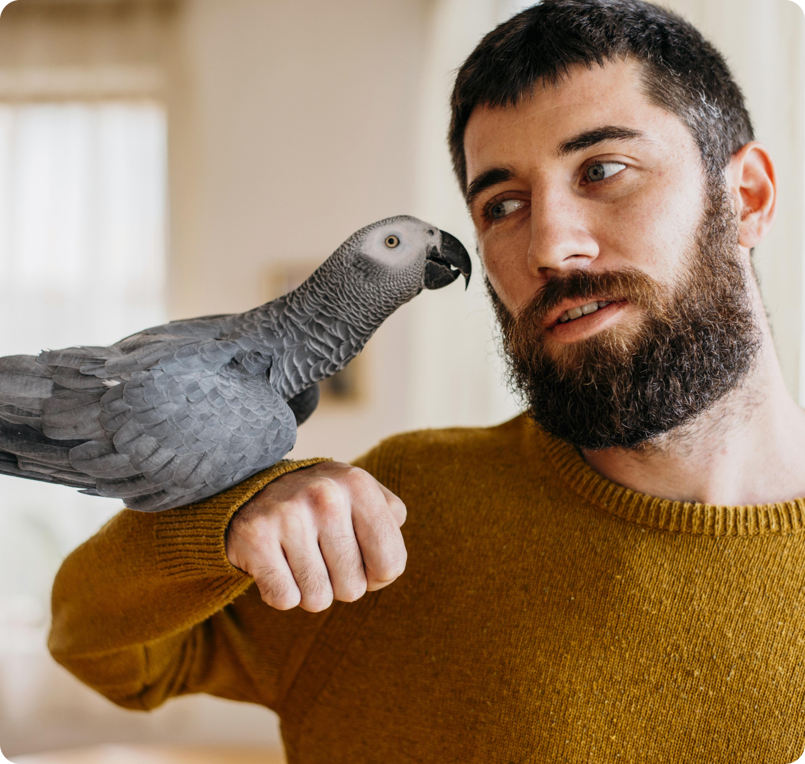 A man holding a bird